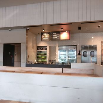 CAVA - We came here for lunch and we glad we did.. it's build your own pita or bowel , your protein and them your dressing and green toppin.. - Mediterranean Near Me - Irvine, California