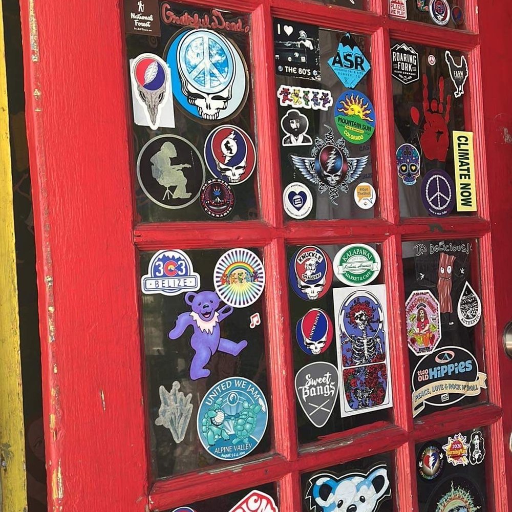 Grateful Deli - a red door with stickers on it - Sandwiches Near Me - Aspen, Colorado Grateful Deli - a red door with stickers on it - Sandwiches Near Me - Aspen, Colorado