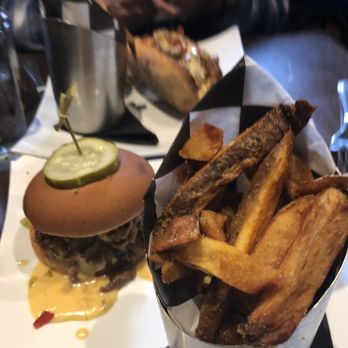 Hootch and Banter - Gluten-free sandwich in the foreground. - New American Near Me - Frederick, Maryland Hootch and Banter - Gluten-free sandwich in the foreground. - New American Near Me - Frederick, Maryland