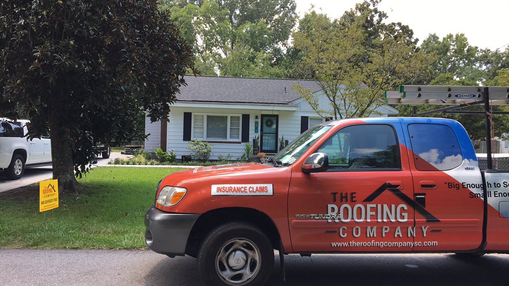 Slide of The Roofing Company