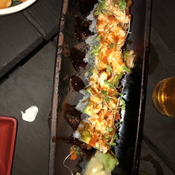 Kanpai - Dynamite Eel: Eel, cucumber, topped with avocado, scallions baked blue crab dynamite - Sushi Bars Near Me - Boca Raton, Florida Kanpai - Dynamite Eel: Eel, cucumber, topped with avocado, scallions baked blue crab dynamite - Sushi Bars Near Me - Boca Raton, Florida