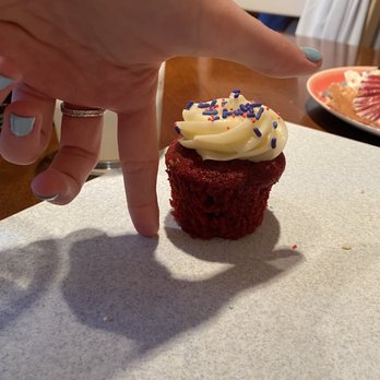 Saint Cupcake - The regular sized cupcake....... Look how tiny! - Bakeries Near Me - Portland, Oregon