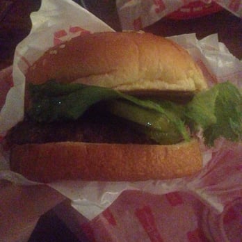 Tasty Burger - Hamburger with lettuce and pickles (lighting is pretty dim in here!) ~$4.45+tax, December 2015 - Burgers Near Me - Boston, Massachusetts Tasty Burger - Hamburger with lettuce and pickles (lighting is pretty dim in here!) ~$4.45+tax, December 2015 - Burgers Near Me - Boston, Massachusetts