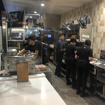 Taco Bell - Assembly line in full force with Taco Bell culinary wizardry on display to the public! - Fast Food Near Me - Rego Park, New York Taco Bell - Assembly line in full force with Taco Bell culinary wizardry on display to the public! - Fast Food Near Me - Rego Park, New York