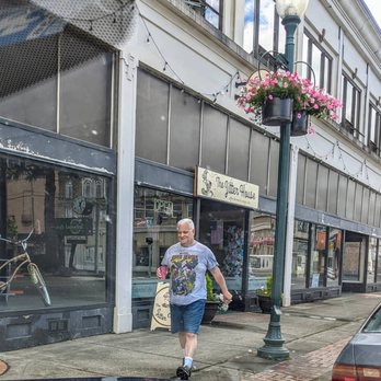 Jitter House - Happy coffee drinker outside The Jitter House - Coffee & Tea Near Me - Hoquiam, Washington