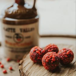 Bootleg Bourbon Balls - Hotsy Totsy - Dark chocolate, cinnamon liqueur/corn whiskey, rolled in crushed red hots