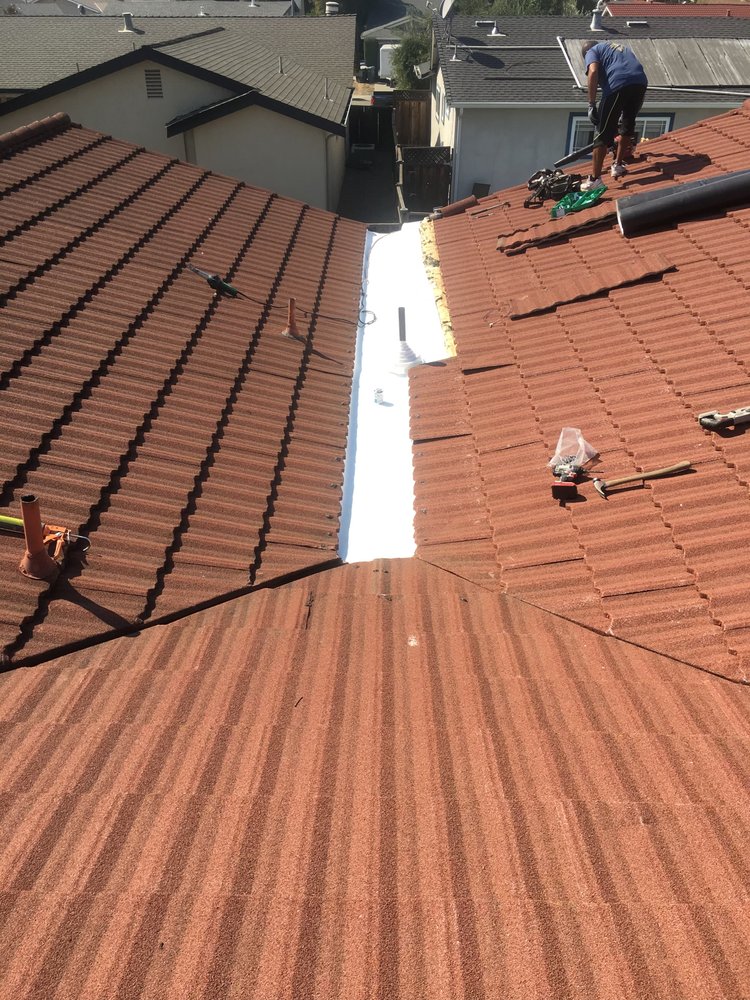 Slide of At the Top Roofing