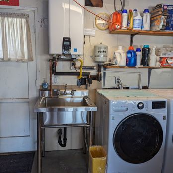 Right Choice Plumbing Pro - Navien tankless water heater with Navilink wifi and utility sink. - Plumbing Near Me Right Choice Plumbing Pro - Navien tankless water heater with Navilink wifi and utility sink. - Plumbing Near Me