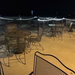 tables and chairs outside at night tables and chairs outside at night
