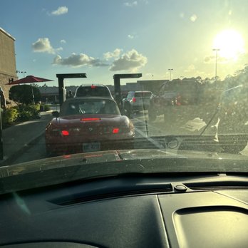 Chick-fil-A - ows a red car in traffic - Fast Food Near Me - Brunswick, Georgia