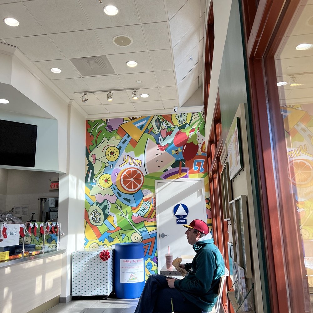 Jamba - a man sitting in a chair in a restaurant - Juice Bars & Smoothies Near Me - Roseville, California Jamba - a man sitting in a chair in a restaurant - Juice Bars & Smoothies Near Me - Roseville, California