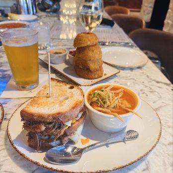 Haywire - Barbacoa grilled cheese sandwich with tortilla soup and onion rings. - New American Near Me - San Antonio, Texas