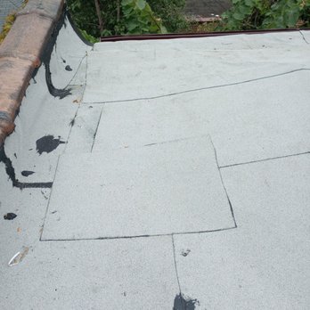 Roofmasters and Masonry - My brand new "roofing system" all patches. - Roofing Near Me - Oak Lawn, Illinois