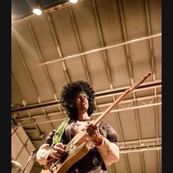 St. Albert Guitar Lessons - Playing live in Churchill Square. Note: The Afro is a wig ;)