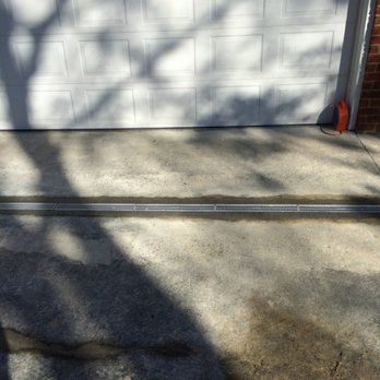 Sundown Construction And Waterproofing - Channel Drain across Driveway - Waterproofing Near Me - Evans, Georgia Sundown Construction And Waterproofing - Channel Drain across Driveway - Waterproofing Near Me - Evans, Georgia