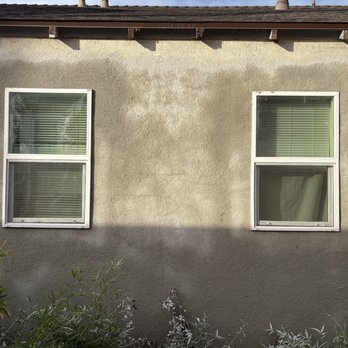 Patch Tech - 2 new windows with matching stucco - Stucco Services Near Me