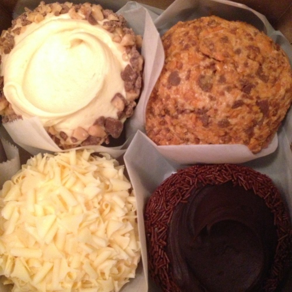 Frosted Cupcakery - Toffee caramel, peanut butter, orange cream cheese and choco choco.(from left) - Bakeries Near Me - Long Beach, California Frosted Cupcakery - Toffee caramel, peanut butter, orange cream cheese and choco choco.(from left) - Bakeries Near Me - Long Beach, California