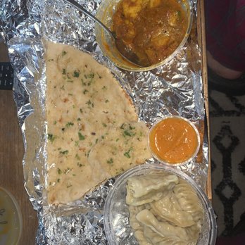 Momo N Curry - Garlic naan, aloo gobi and chicken Momo.  Aloo Gobi 8 Pieces Steamed Momo Chicken Garlic Naan - Indian Near Me - Concord, California