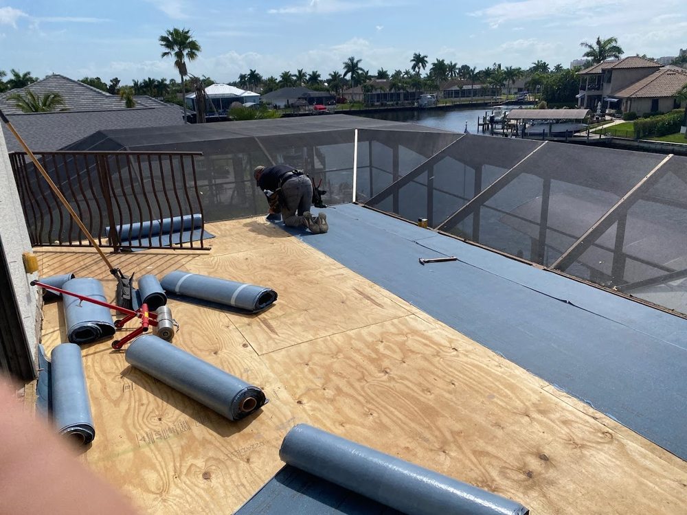 Slide of Whitby Roofing