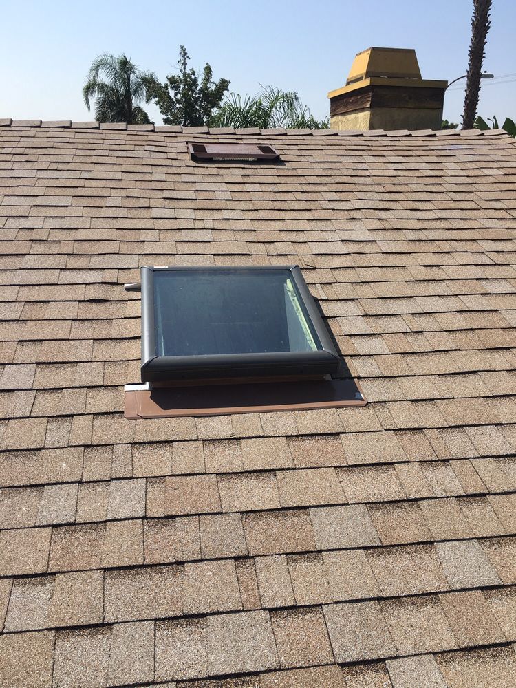 Slide of Thompson Roofing