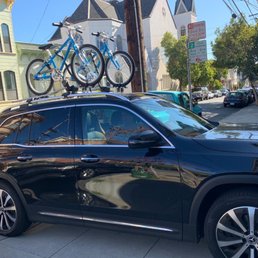 Car with bikes on bike racks Car with bikes on bike racks