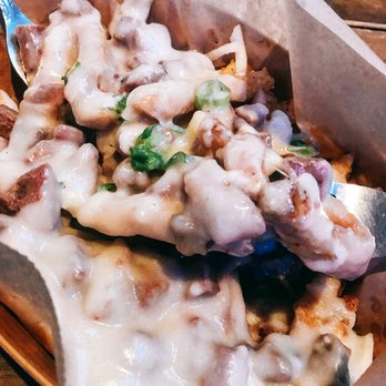 Biergarten - Poutine-kalbi, tempura fries, white cheddar, scallion, beef gravy: $14 - Gastropubs Near Me - Los Angeles, California Biergarten - Poutine-kalbi, tempura fries, white cheddar, scallion, beef gravy: $14 - Gastropubs Near Me - Los Angeles, California