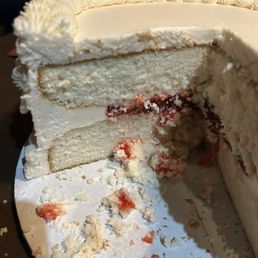 Half the filling was frosting . Cake fell apart when slicing it. Half the filling was frosting . Cake fell apart when slicing it.