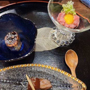 Sushi Jin - The appetizer course of freshly grilled eggplant, quail egg with chutoro, and seasoned tuna with daikon - Sushi Bars Near Me - New York, New York