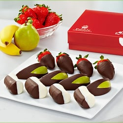 Edible Arrangements - A box of the best dipped fruit. Period. Chocolate strawberries, banana wedges, and granny smith apple pieces.