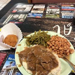 Porky's Bar B Q - Beef Stew over mashed potatoes with pinto & green beans. Plus homemade hot bread