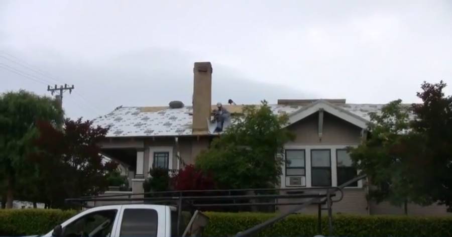 Slide of Wolfy's Roofing