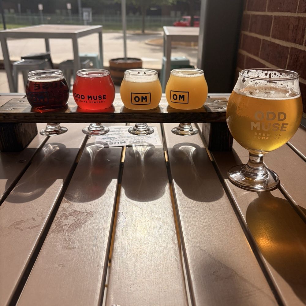 Odd Muse Craft & Kitchen - Flight on the patio - Brewpubs Near Me - Plano, Texas Odd Muse Craft & Kitchen - Flight on the patio - Brewpubs Near Me - Plano, Texas