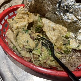 absolute soup of a burrito, i don't know who they are hiring but this is foul. should never have to use a fork to eat a burrito. absolute soup of a burrito, i don't know who they are hiring but this is foul. should never have to use a fork to eat a burrito.