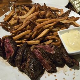 Steak Frites, cooked rare.