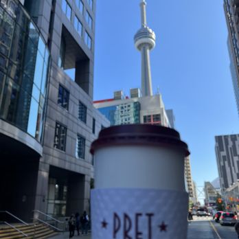 A&W - a person holding a cup of coffee - Fast Food Near Me - Toronto, Ontario