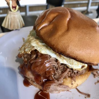 Moa Kai Hawaiian Diner - Kalua BBQ Pork sandwich -- toasted brioche, kalua pork, pickled red onions, house-made guava bbq sauce (added the egg) - Hawaiian Near Me - Orlando, Florida Moa Kai Hawaiian Diner - Kalua BBQ Pork sandwich -- toasted brioche, kalua pork, pickled red onions, house-made guava bbq sauce (added the egg) - Hawaiian Near Me - Orlando, Florida
