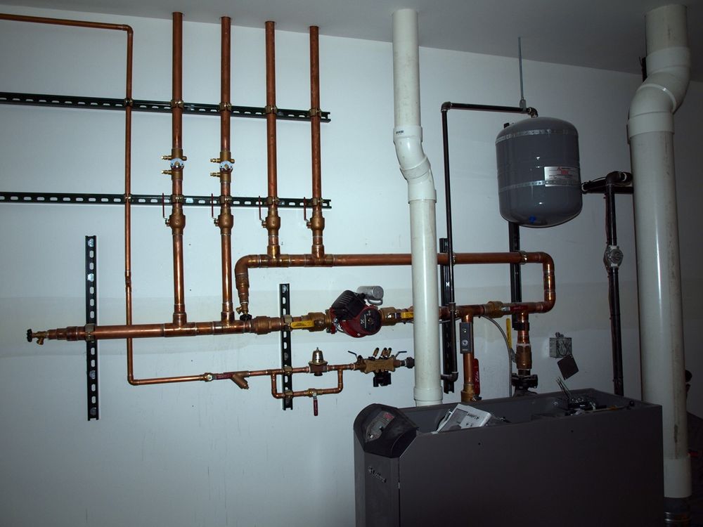 Slide of Team Bob's Heating, Cooling, Plumbing