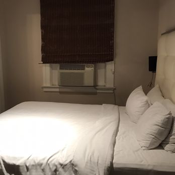 Hotel Union Square - Taken with no filters, back against the door.  "Deluxe Queen"...really??? - Hotels Near Me - San Francisco, California