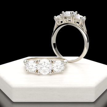 Godwin's Jewelers - Jeweler's redesign of my engagment ring. My original band plus new cathedral setting and two side diamonds added. - Jewelry Near Me - Bainbridge, Georgia Godwin's Jewelers - Jeweler's redesign of my engagment ring. My original band plus new cathedral setting and two side diamonds added. - Jewelry Near Me - Bainbridge, Georgia
