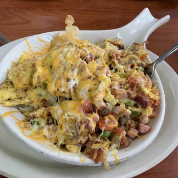 Brandon's Diner - Country Skillet-potatoes topped with eggs, sausage,ham,bacon, onion, tomato,Bell peppers and cheese. - Diners Near Me - Fontana, California