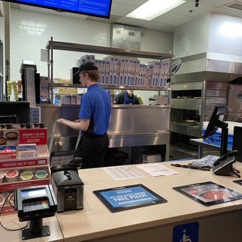 Domino's Pizza - a man working in a restaurant - Pizza Near Me - Haymarket, Virginia Domino's Pizza - a man working in a restaurant - Pizza Near Me - Haymarket, Virginia