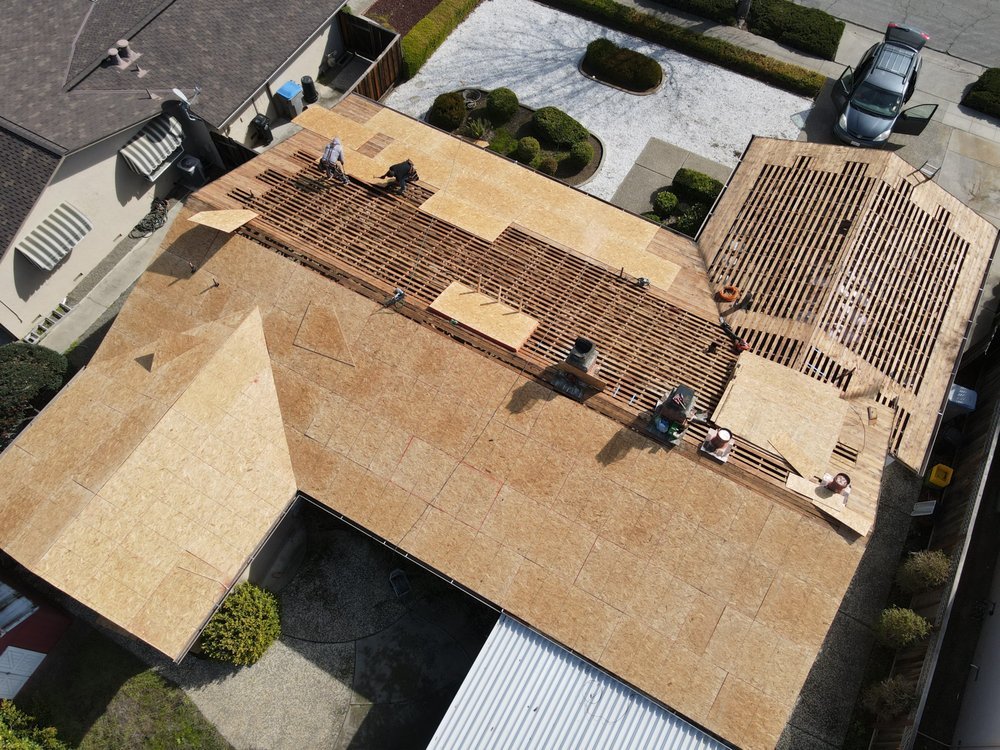 Slide of ELM Roofing Contractors