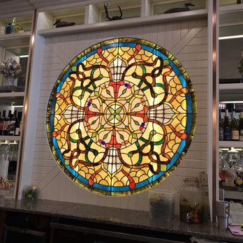 Bay Local Eatery - The lighted stained glass window behind the bar. Simply cute! - Breakfast & Brunch Near Me - Virginia Beach, Virginia