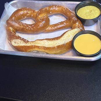 Vogue Tavern - The Bavarian Pretzel - smiling at you like go get one and eat me. Lol - Burgers Near Me - Chula Vista, California Vogue Tavern - The Bavarian Pretzel - smiling at you like go get one and eat me. Lol - Burgers Near Me - Chula Vista, California