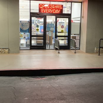 Walgreens - Bright neon sign saying open - Drugstores Near Me - Millbrae, California