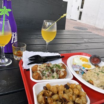 Werewolf - Breakfast balls and side of potato's (left) biscuits and sausage (right) - Breakfast & Brunch Near Me - San Diego, California Werewolf - Breakfast balls and side of potato's (left) biscuits and sausage (right) - Breakfast & Brunch Near Me - San Diego, California