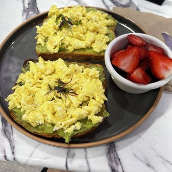 Kaffeinated Crepes and Coffee - Avocado & Egg Toast with a fruit cup. - Coffee & Tea Near Me - Webster, Texas Kaffeinated Crepes and Coffee - Avocado & Egg Toast with a fruit cup. - Coffee & Tea Near Me - Webster, Texas