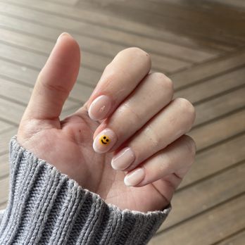 Leesburg Nails Spa - Skinny French tip manicure, oval shape, smiley face detail - Nail Salons Near Me - Leesburg, Virginia Leesburg Nails Spa - Skinny French tip manicure, oval shape, smiley face detail - Nail Salons Near Me - Leesburg, Virginia