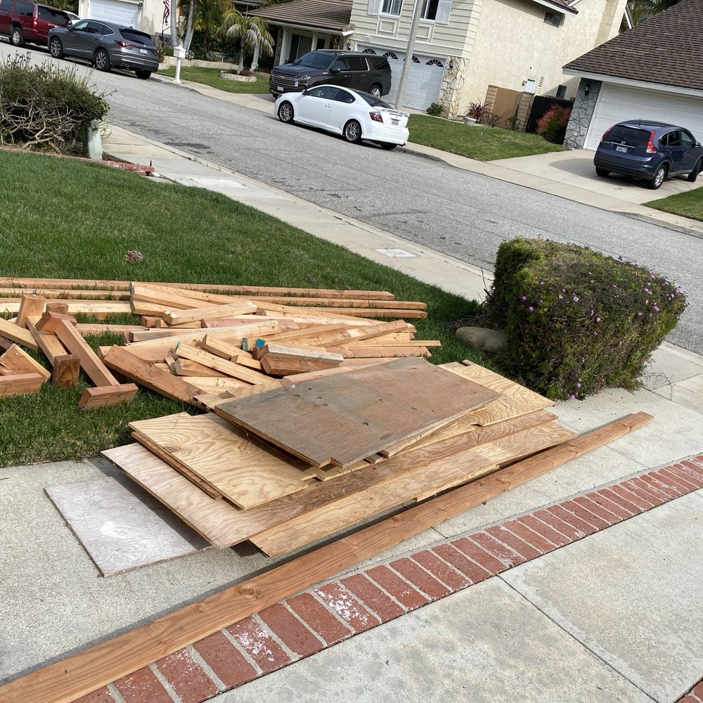 The Junk Wizards - Old garage wood that the previous owner installed. - Junk Removal & Hauling Near Me - Thousand Oaks, California