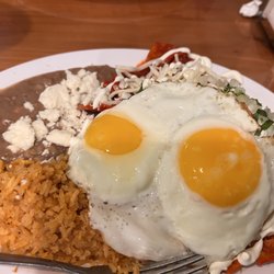 Chilaquiles and eggs with rice and beans